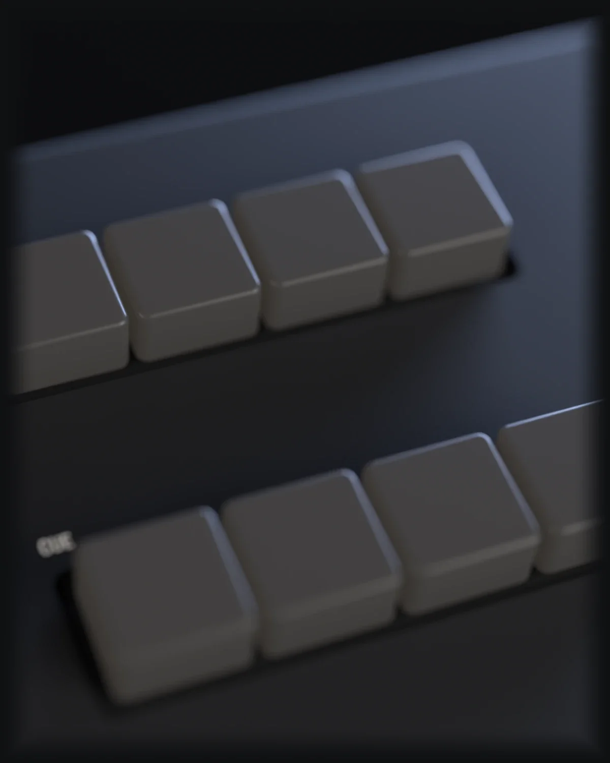 The master and cue keys on the right of the panel.