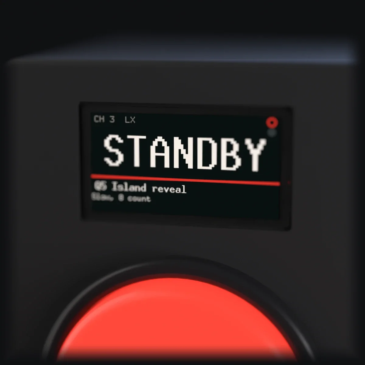 Close up: the Wing's display reads STANDBY over a red bar, with Q5 Island reveal and Slow, 8 count beneath. The red button glows below it.